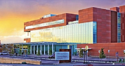 UNM Comprehensive Cancer Center facility at sunset