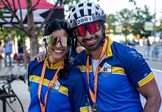 Two riders with medals