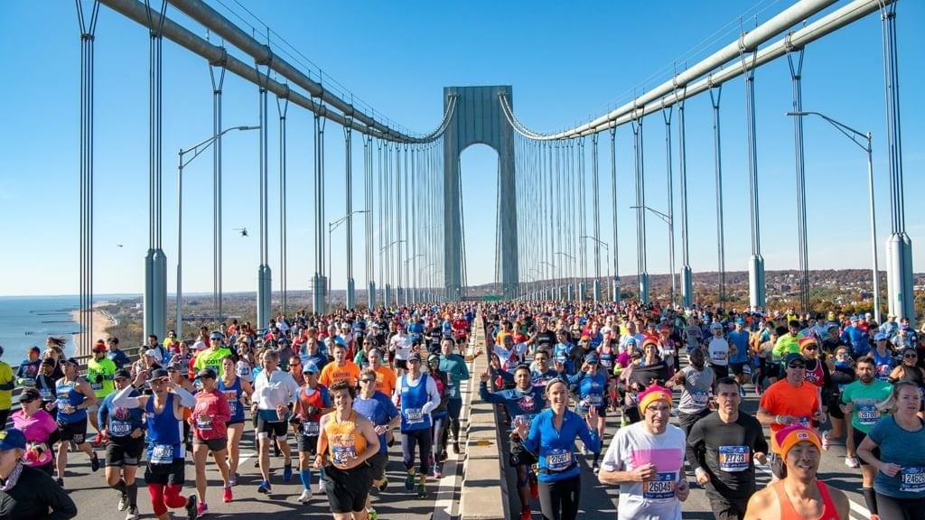 People running for Finish MS across bridge