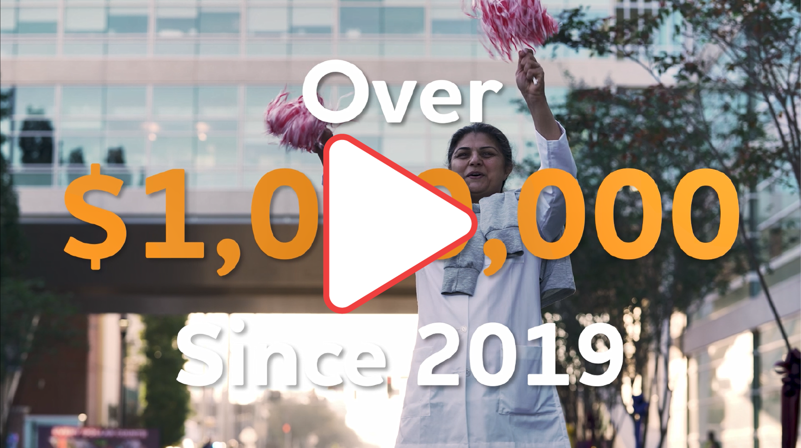 A researcher waving pom poms with the words "Over $1,000,000 since 2019." There is also a play symbol indicating a link.
