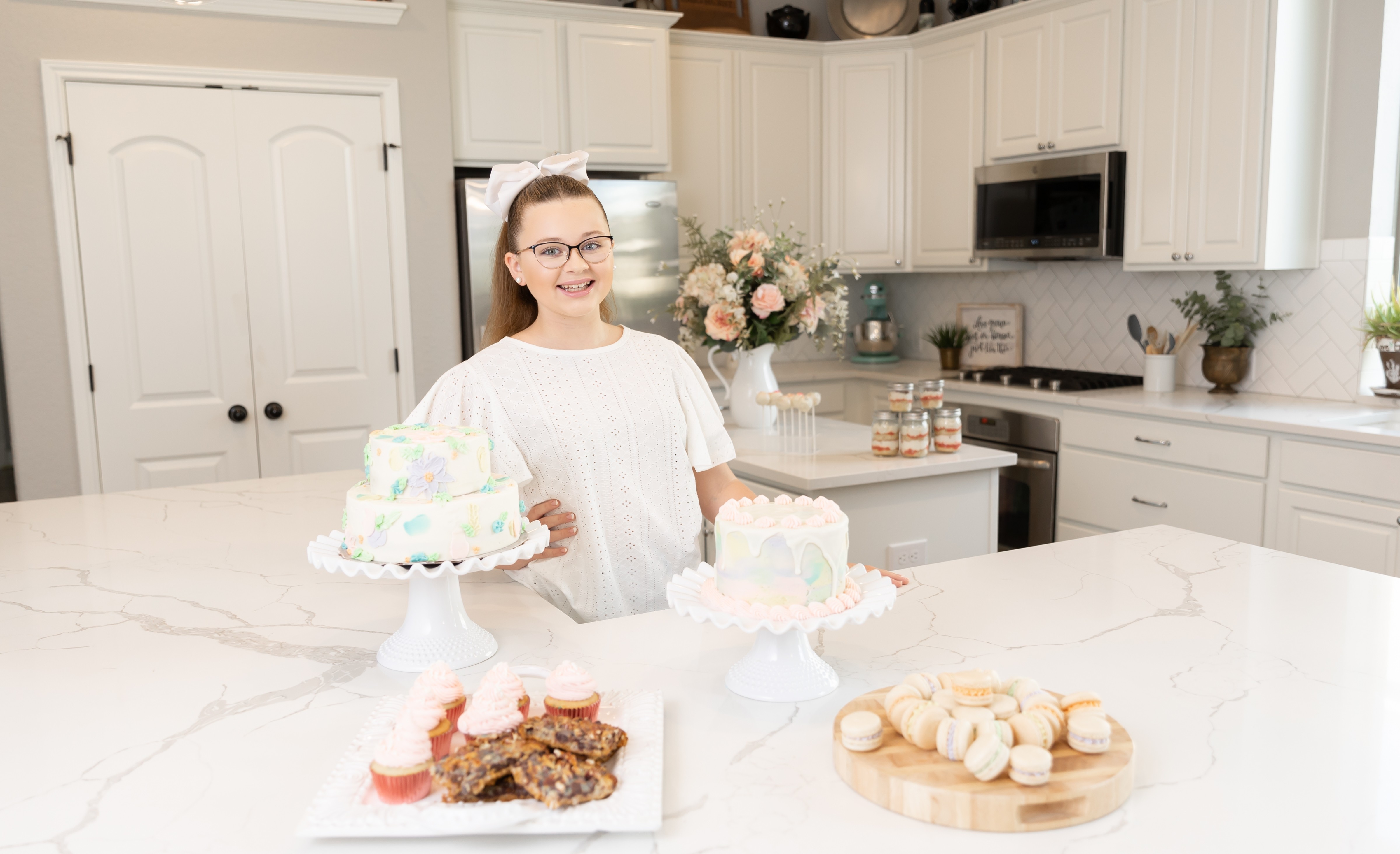 Girl in kitchen featuring baking goods